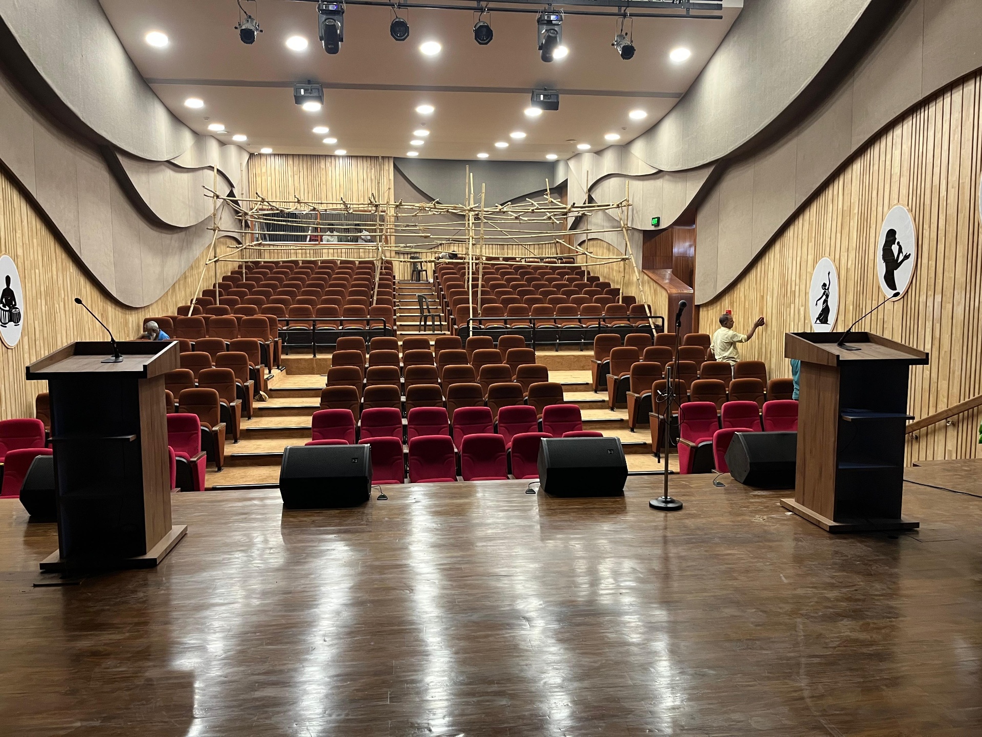Auditorium sound reinforcement and stage lighting